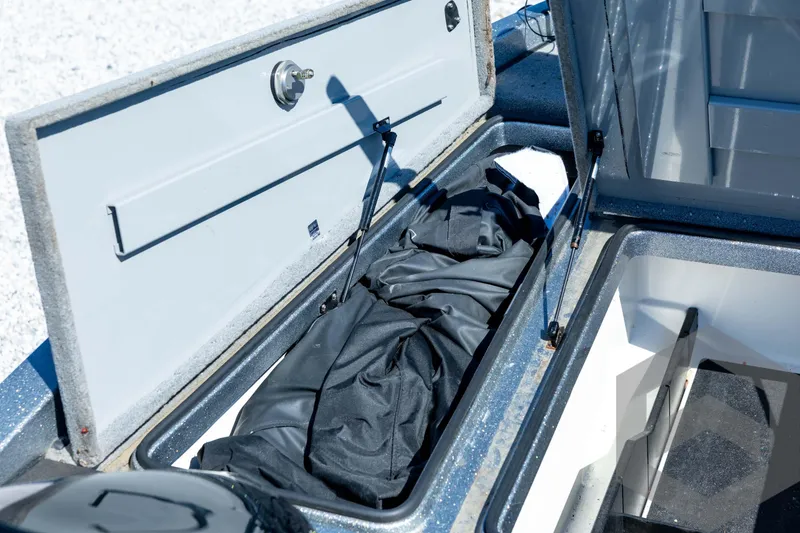 Slide: The Image of 2023 Caymas CX19 boat interior with sleek design and comfortable seating. - 46