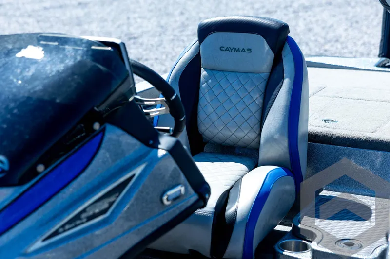 Slide: The Image of 2023 Caymas CX19 boat control panel with switches and throttle lever. - 50