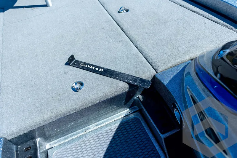 Slide: The Image of 2023 Caymas CX19 boat interior with Hot Foot throttle pedal. - 52