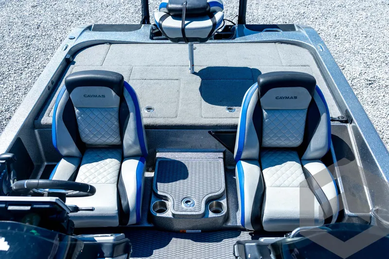 Slide: The Image of 2023 Caymas CX19 boat storage compartments with open lids, showcasing interior space. - 54