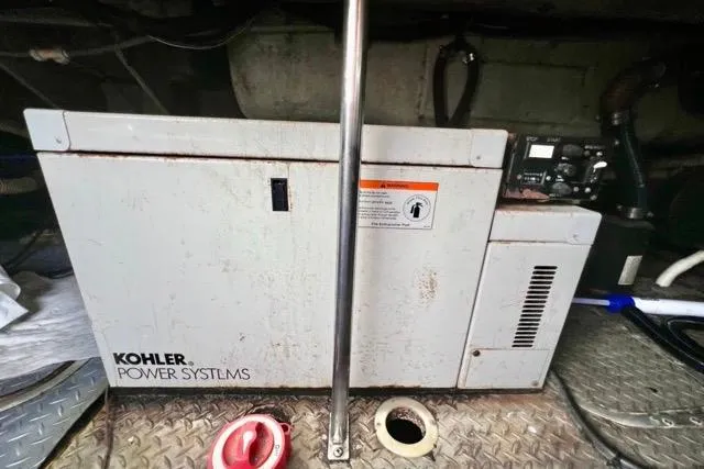 Slide: The Image of Kohler Power Systems generator in a 1995 Regal Commodore 400 boat engine room. - 15
