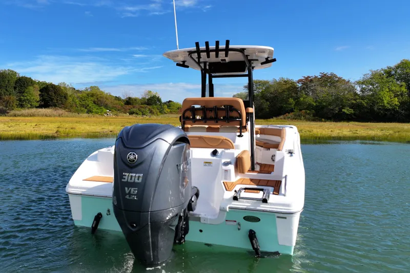 The Image of 2026 NauticStar 242 Offshore boat with Yamaha V6 engine on calm water. - 1