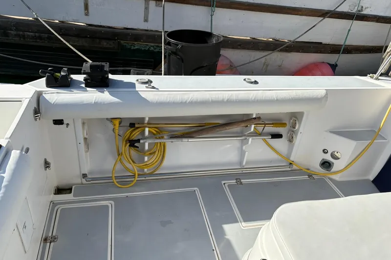 Slide: The Image of 2005 Albin 28 Tournament Express boat deck with storage and equipment. - 13