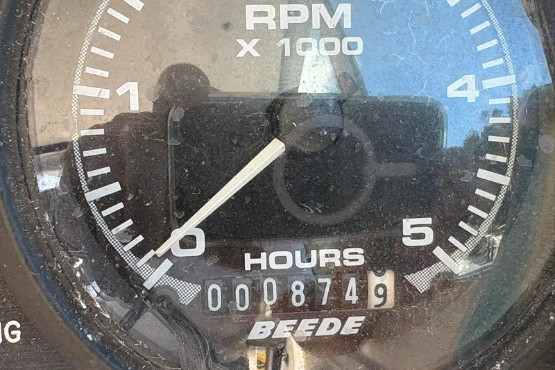 Slide: The Image of Close-up of RPM gauge on 2005 Albin 28 Tournament Express boat, showing 874.9 hours. - 24