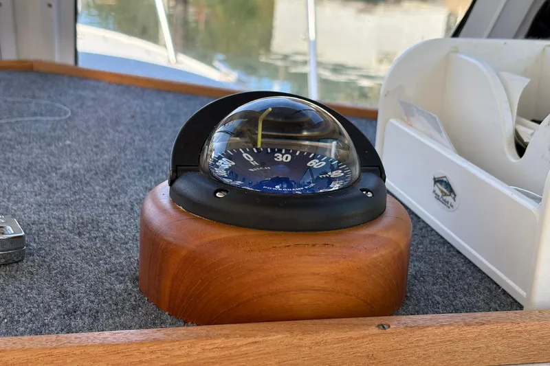 Slide: The Image of Compass on Albin 28 Tournament Express 2005 boat, mounted on wooden base. - 26