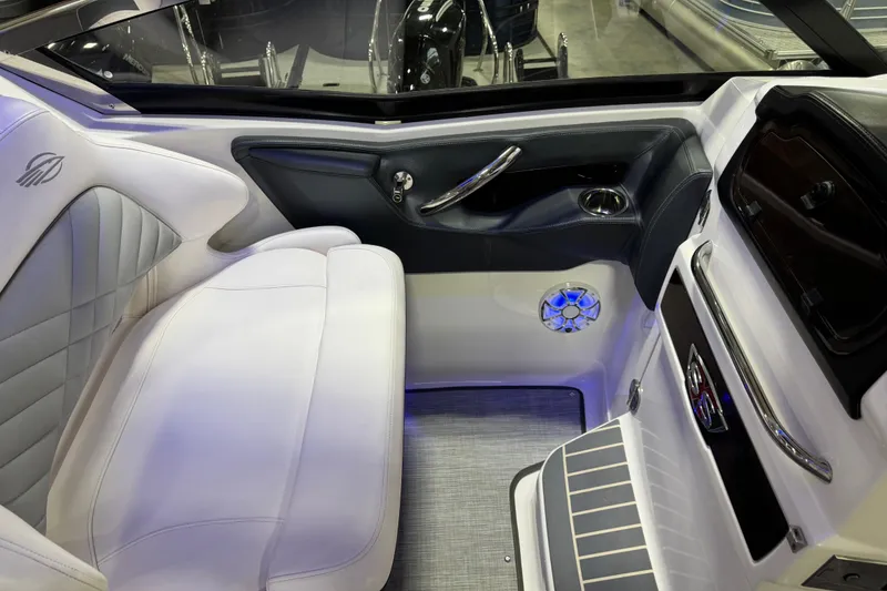 Slide: The Image of 2019 Chaparral 347 SSX boat interior with luxurious seating and modern design. - 10