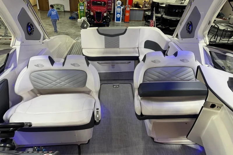 Slide: The Image of 2019 Chaparral 347 SSX boat interior with luxurious seating and modern design. - 11