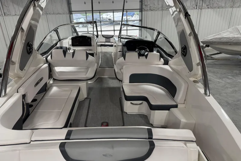 Slide: The Image of 2019 Chaparral 347 SSX boat interior with sleek seating and modern design. - 16