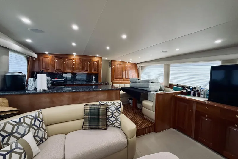 Slide: The Image of Luxurious interior of a 2004 Viking 65 Convertible yacht with modern amenities. - 15
