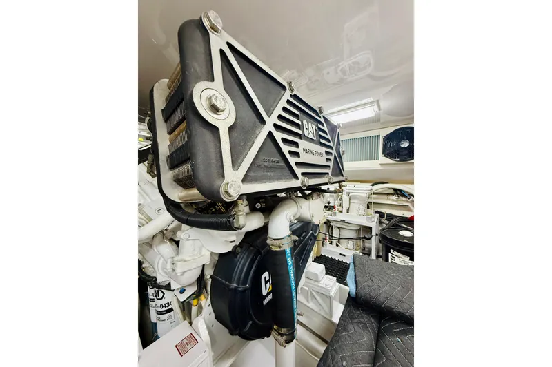 Slide: The Image of Engine room of 2004 Viking 65 Convertible with CAT marine power components. - 52
