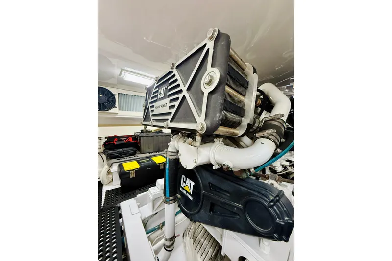 Slide: The Image of Engine room of 2004 Viking 65 Convertible with CAT marine power components. - 53