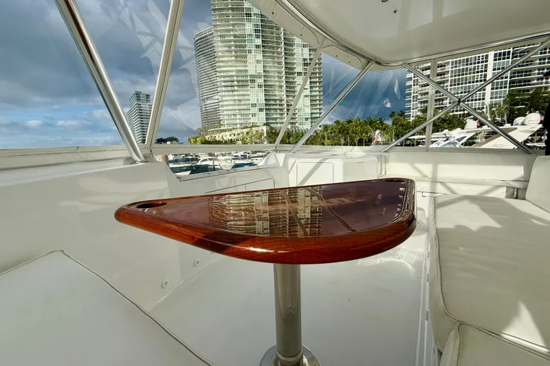 Slide: The Image of Luxurious interior of 2004 Viking 65 Convertible yacht with cityscape view. - 79
