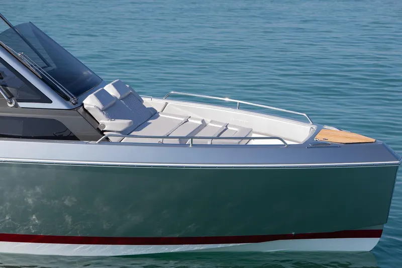 Slide: The Image of 2026 Schaefer V34 yacht with dual 300 V8 engines at a boat show. - 4