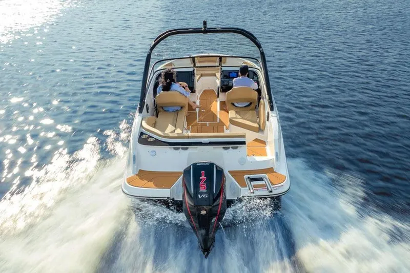 Slide: The Image of Manufacturer Provided Image: 2025 Bayliner V20 boat cruising on open water, featuring a powerful 175 V6 engine. - 2