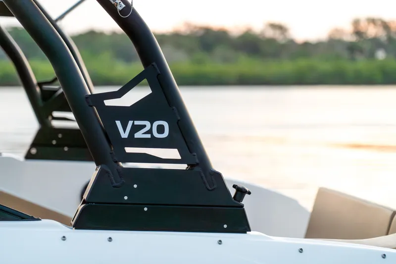 Slide: The Image of 2026 Bayliner V20 boat detail with sleek design on a serene water backdrop. - 9