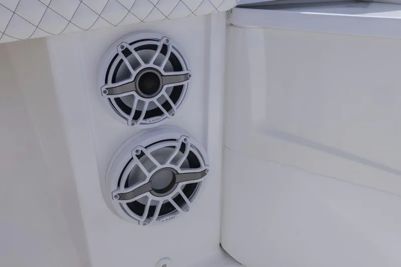 Slide: The Image of Dual speakers on a 2023 HCB 39 Speciale boat, featuring sleek white design. - 20