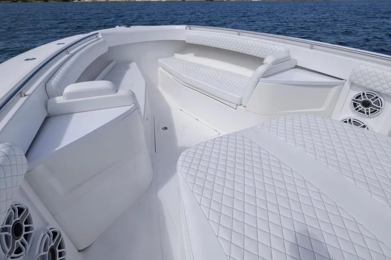 Slide: The Image of Luxurious interior of 2023 HCB 39 Speciale boat with white quilted seating. - 21