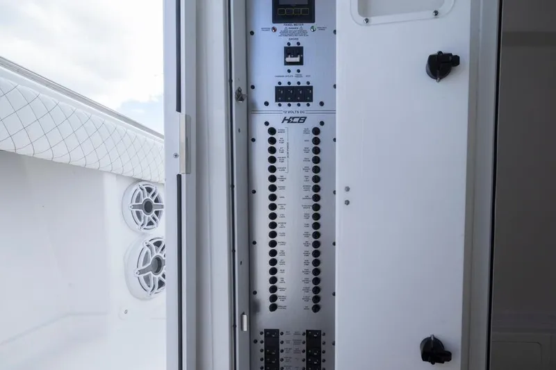 Slide: The Image of Electrical panel of 2023 HCB 39 Speciale boat, featuring control switches and speakers. - 26