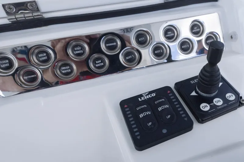 Slide: The Image of Control panel of 2023 HCB 39 Speciale boat with switches and joystick. - 33