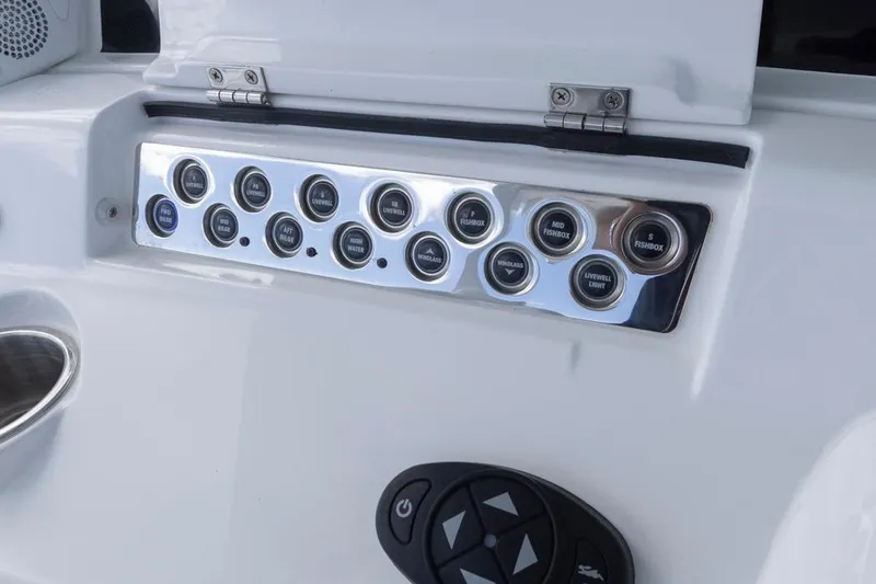 Slide: The Image of Control panel of 2023 HCB 39 Speciale boat with labeled buttons. - 34