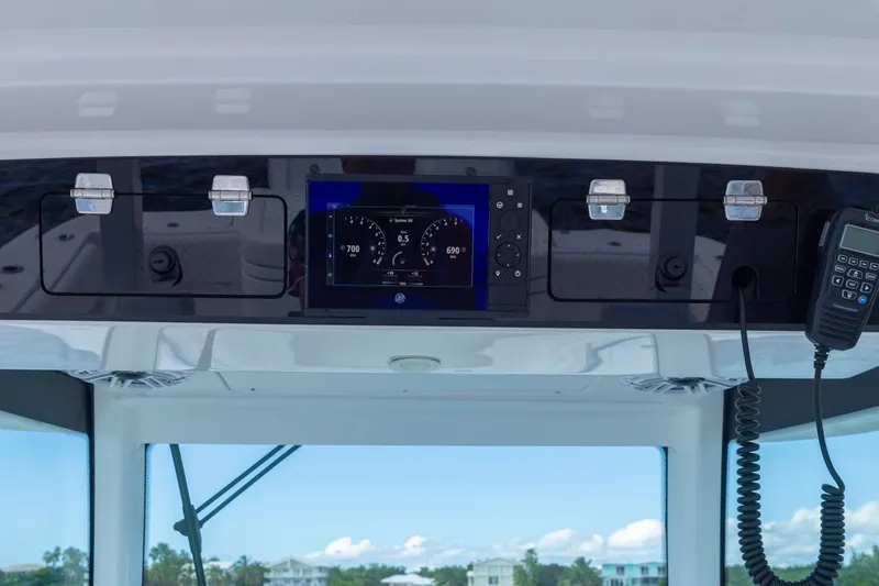 Slide: The Image of 2023 HCB 39 Speciale dashboard with modern navigation and communication equipment. - 35