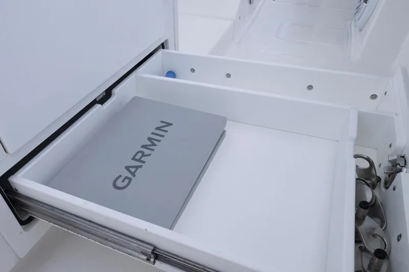 Slide: The Image of Open drawer on 2023 HCB 39 Speciale boat with Garmin device inside. - 46