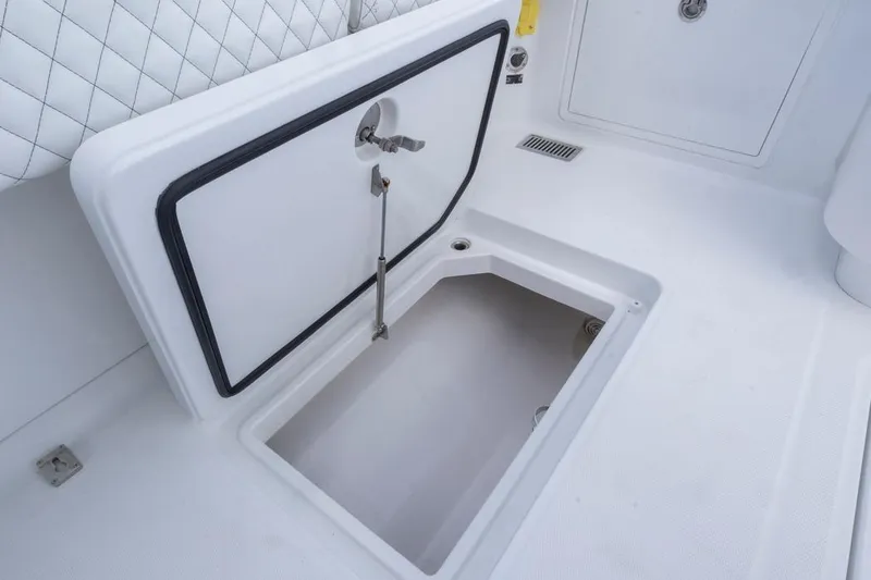 Slide: The Image of 2023 HCB 39 Speciale boat storage compartment with open hatch. - 52