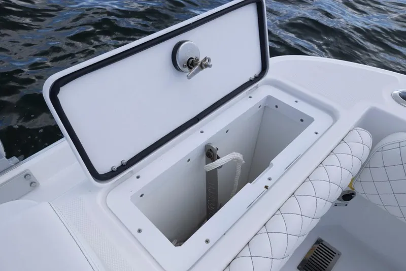 Slide: The Image of 2023 HCB 39 Speciale boat storage compartment with open hatch, showing interior details. - 57