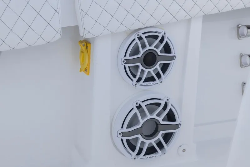 Slide: The Image of 2023 HCB 39 Speciale boat speakers and seating detail, featuring JL Audio components. - 60