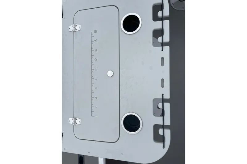 Slide: The Image of 2026 Starcraft EX 20 FD boat interior with white seats and a central table. - 8