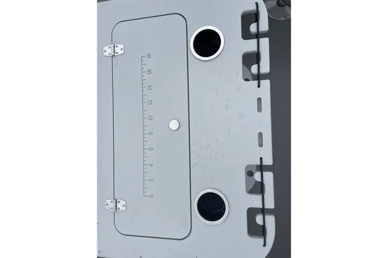 Slide: The Image of Starcraft EX 20 FD 2026 boat hatch with measurement scale and circular openings. - 9