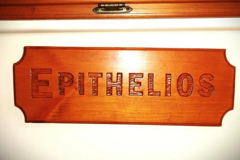 Slide: The Image of Wooden plaque with "EPITHELIOS" engraved, Island Packet 420, 2002 model. - 3