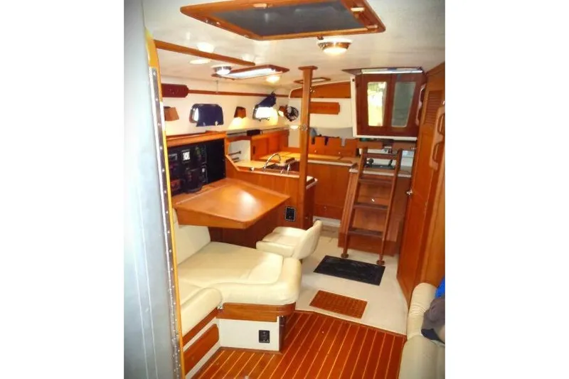 Slide: The Image of Interior of 2002 Island Packet 420 yacht with wood finish and comfortable seating. - 4