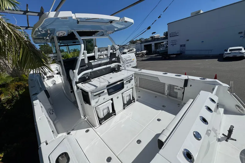 Slide: The Image of 2021 Blackfin 332 CC boat with spacious deck and modern amenities. - 12