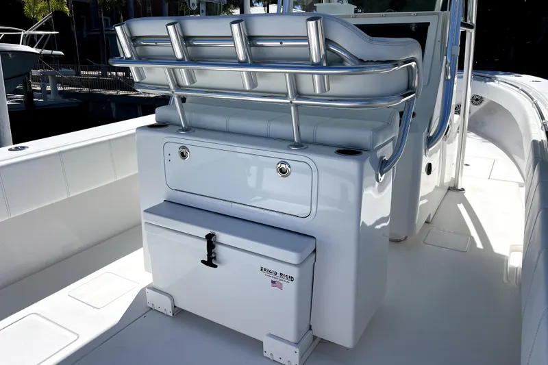 Slide: The Image of 2024 Contender 32 ST boat interior with seating and storage compartments. - 10
