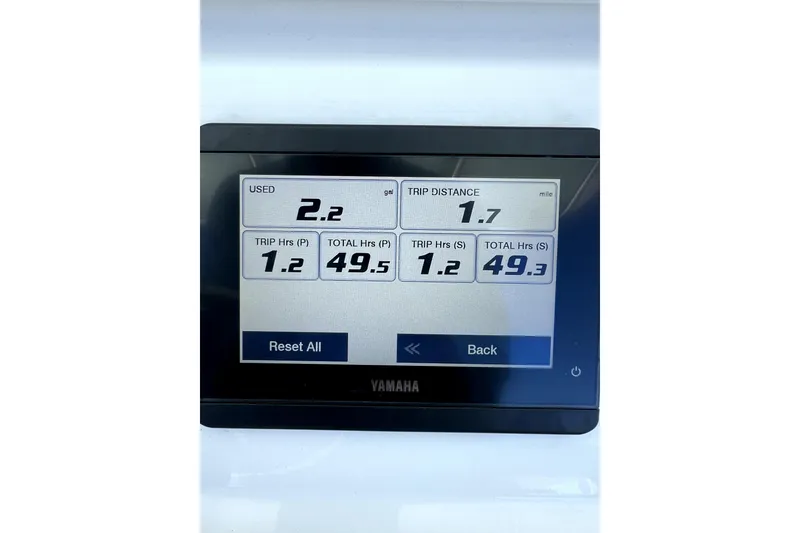 Slide: The Image of Yamaha display showing fuel usage and trip data for 2024 Contender 32 ST boat. - 18