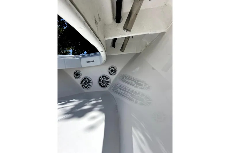 Slide: The Image of 2024 Contender 32 ST boat interior with speakers and rod holders. - 23