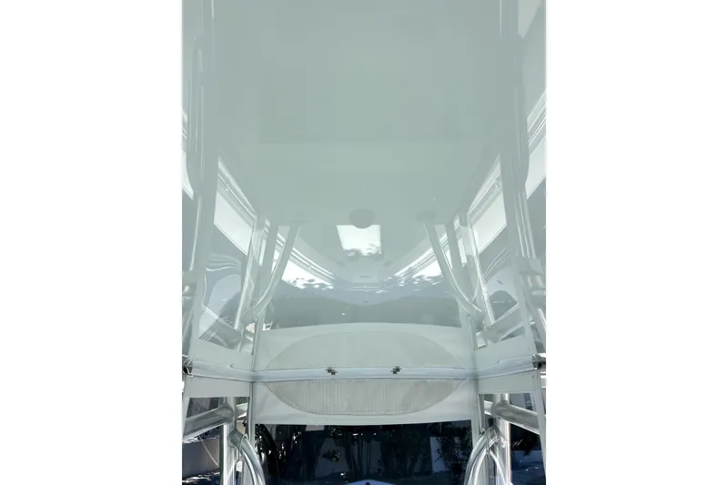Slide: The Image of 2024 Contender 32 ST boat, sleek design, viewed from below, showcasing polished surfaces. - 26