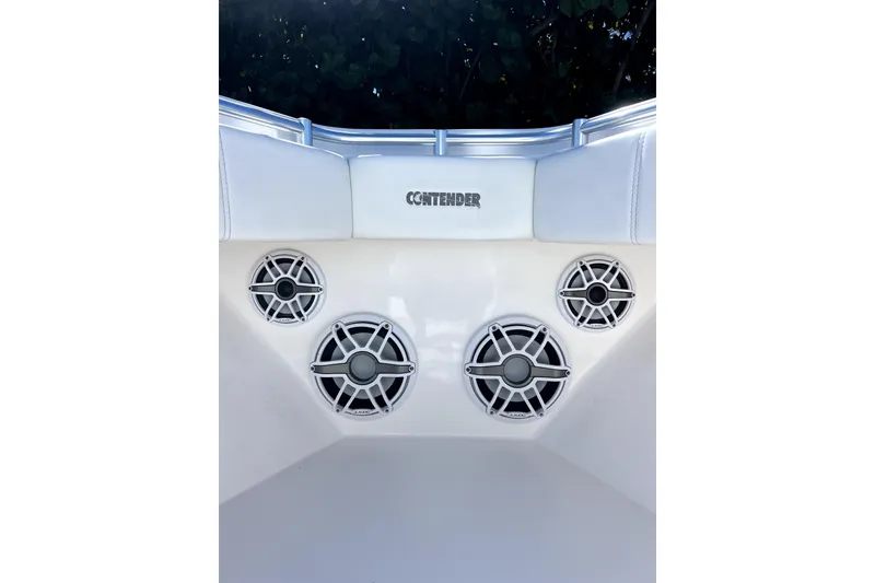 Slide: The Image of 2024 Contender 32 ST boat interior with speakers and logo. - 5