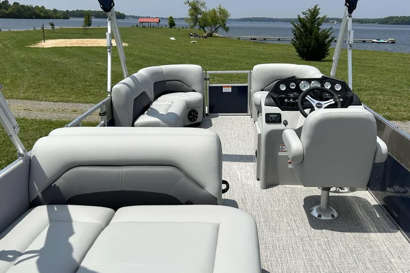 Slide: The Image of 2023 Landau Island Breeze 232 Cruise pontoon boat interior with lake view. - 7