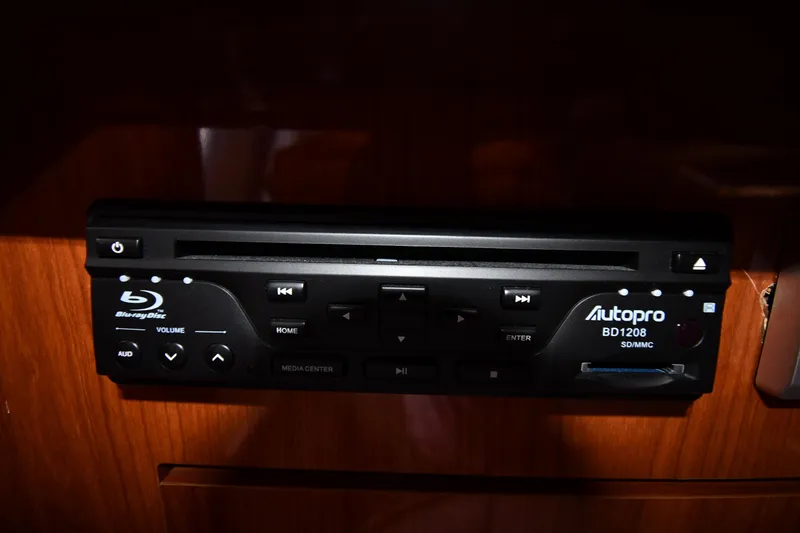 Slide: The Image of Blu-ray player in 2005 Regal 3060 Window Express boat, featuring Autopro BD1208 model. - 44