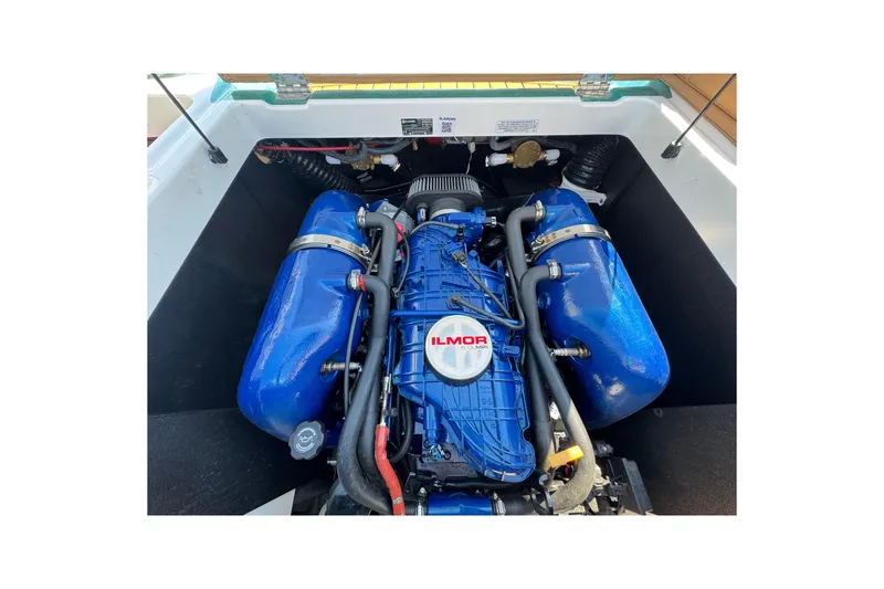 Slide: The Image of 2021 MasterCraft XT22 Ilmor engine, blue components, detailed view. - 27