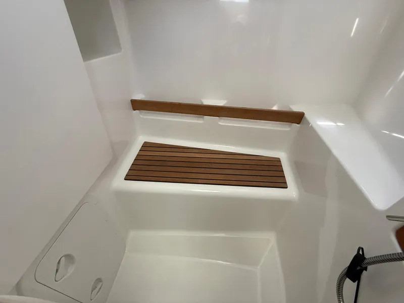 Slide: The Image of Bathroom interior of 2016 Beneteau Swift Trawler 30 with toilet and sink. - 20