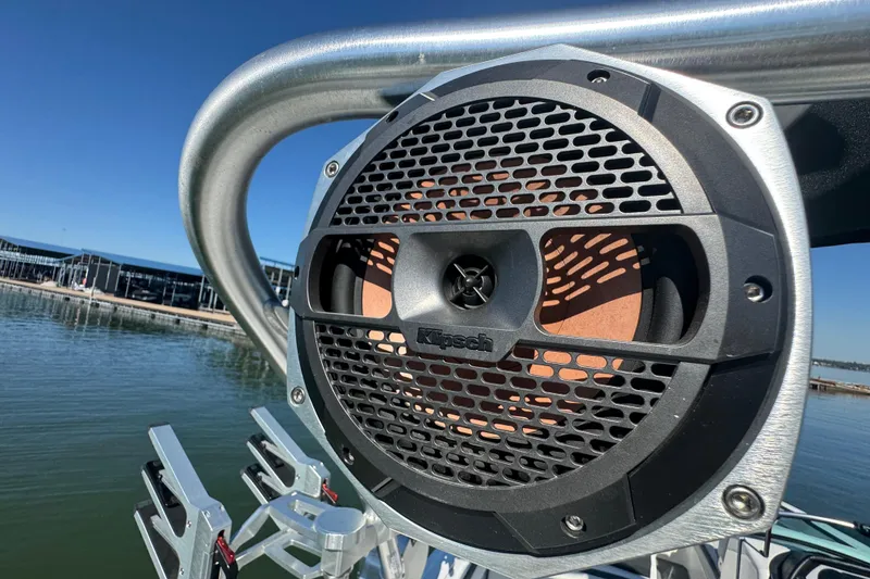 Slide: The Image of Close-up of Klipsch speaker on 2018 MasterCraft XStar boat, dockside view. - 31