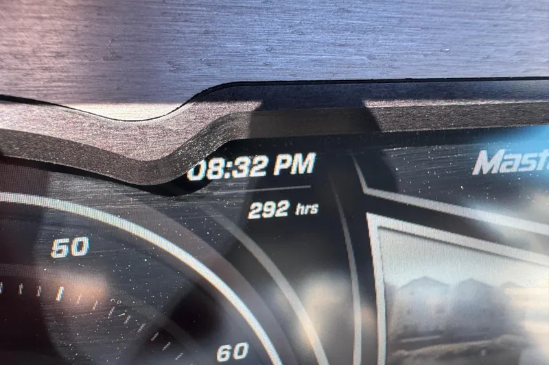 Slide: The Image of Dashboard of 2018 MasterCraft XStar showing 292 hours and time 08:32 PM. - 37