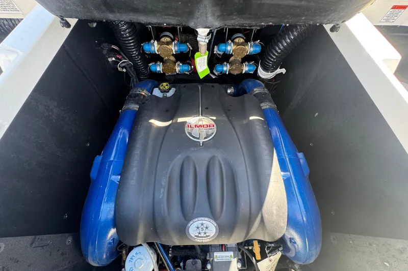 Slide: The Image of Engine compartment of a 2018 MasterCraft XStar boat featuring an Ilmor engine. - 38