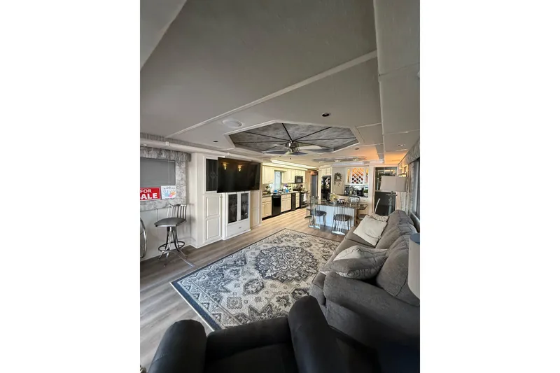 Slide: The Image of Luxurious 2001 Fantasy houseboat interior with modern kitchen, cozy living area, and elegant decor. - 5