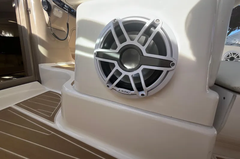 Slide: The Image of Speaker system on 2002 Sea Ray 300 Sundancer boat, featuring JL Audio equipment. - 14
