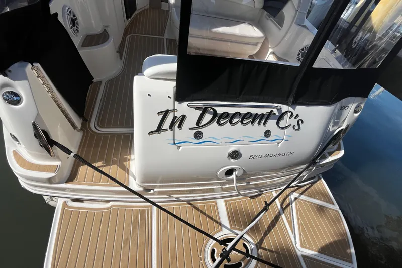 Slide: The Image of 2002 Sea Ray 300 Sundancer boat with "In Decent C's" name at Belle Maer Harbor. - 5