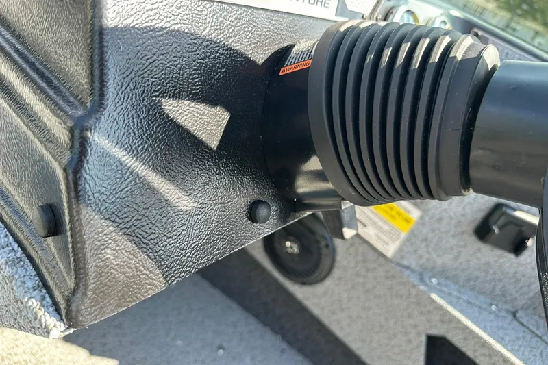 Slide: The Image of 2026 Lund 1775 Adventure Sport boat interior with windshield and seating. - 14